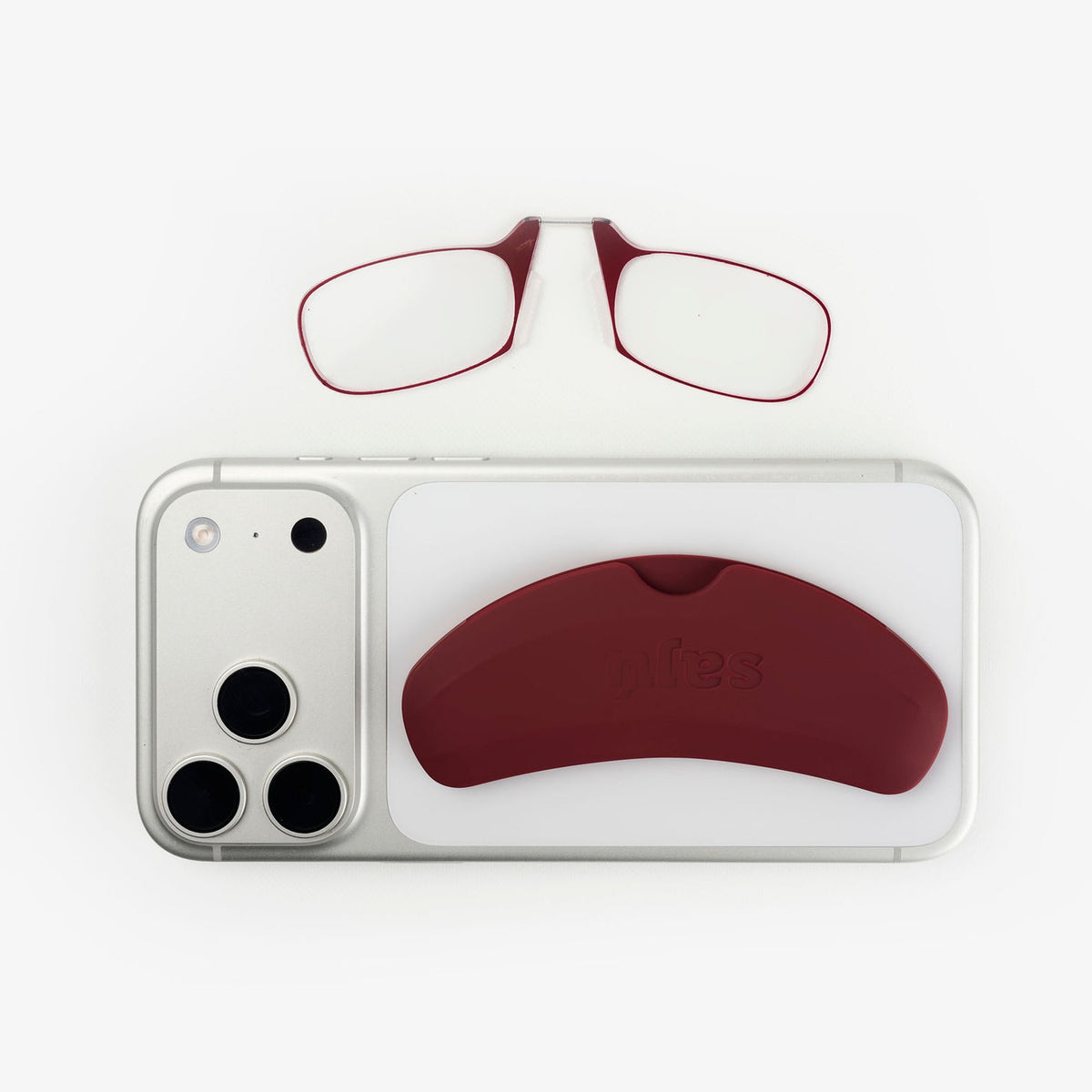 Gafas de lectura Phone Glasses Burgundy junto al celular con el estuche adhesivo